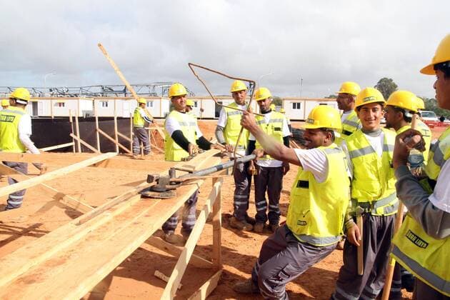 (140226) -- TRIPOLI, Feb. 26, 2014(Xinhua) -- Workers work at the construction site of Libyan National Stadium that is to host the 2017 Africa Cup of Nations, in Libya s capital of Tripoli, on Feb. 26, 2014. A ceremony for the laying of a foundation stone of the stadium is held here on Wednesday. (Xinhua Hamza Turkia) LIBYA-TRIPOLI-AFR2017-STADIUM 