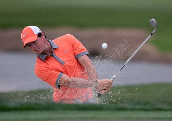 Feb. 27, 2014 - Palm Beach Gardens, FL, USA - Rory McIlroy hits out of a bunker on the 18th hole during the first round of the Honda Classic in Palm Beach Gardens, Fla., on Thursday, Feb. 27, 2014. 2014 Honda Classic - ZUMAm67