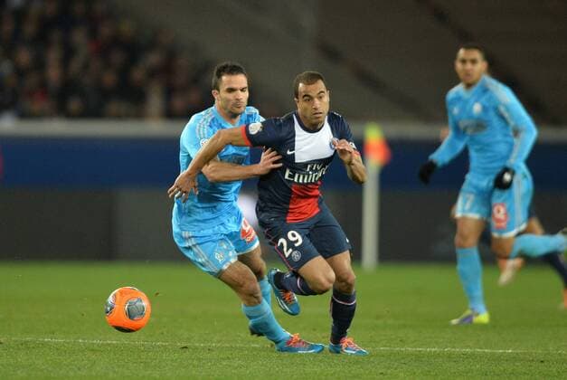 Lucas (psg) - Jeremy Morel (om) FOOTBALL : Paris SG vs Marseille - Ligue 1 - 02 03 2014 AnthonyBIBARD FEP Panoramic 