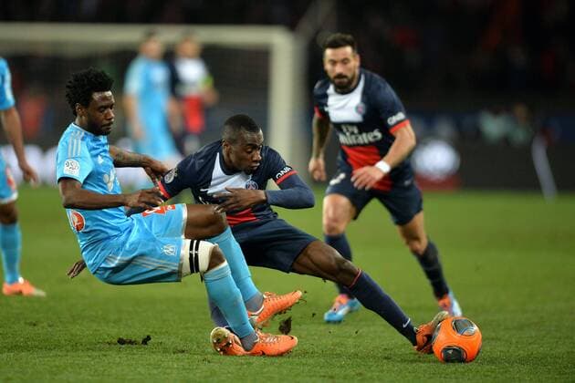 Blaise Matuidi (psg) - Julio Nkoulou (om) FOOTBALL : Paris SG vs Marseille - Ligue 1 - 02 03 2014 AnthonyBIBARD FEP Panoramic 