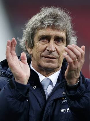 Manuel Pellegrini, manager of Manchester City greets after the Capital One Cup (The League Cup) Final between Manchester City and AFC Sunderland FC at Wembley Stadium in London, Britain on March 2, 2014. Manchester City won 3-1.