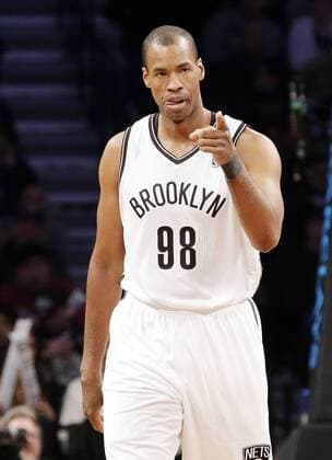 Brooklyn Nets Jason Collins points up the court in his first game ever at home as a Nets player against the Chicago Bulls in the fourth quarter at Barclays Center in New York City on March 3, 2014. The Nets defeated the Bulls 96-80  NYP20140303136