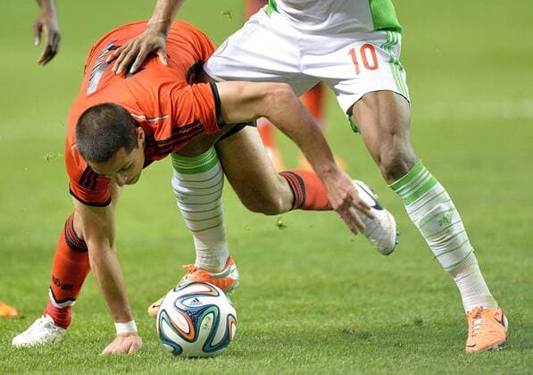 March 5, 2014 - Atlanta, GA, USA - Mexico s Javier Hernandez (14) and Nigeria s John Obi Miel (10) battle for the ball during an international friendly soccer match at the Georgia Dorm in Atlanta on Wednesday, March 5, 2014. Nigeria vs. Mexico - ZUMAm67