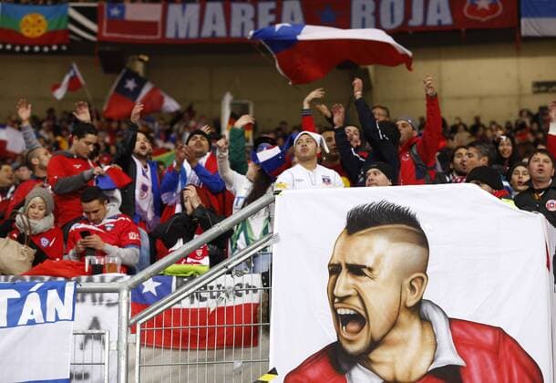 Chile Fans and Arturo Vidal (R) during the friendly match, Mercedes-Benz Arena in Stuttgart on March 05, 2014.