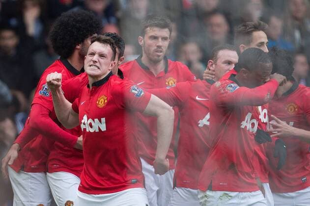 Phil Jones of Manchester United celebrates his opening goal - Barclays Premier League - West Bromwich Albion vs. Manchester United - The Hawthorns - Birmingham - England - 8th March 2014 - Picture Philip Oldham Sportimage EDITORIAL USE ONLY. No use with unauthorised audio, video, data, fixture lists, club league logos or live services. Online in-match use limited to 120 images, no video emulation. No use in betting, games or single club league player publications.