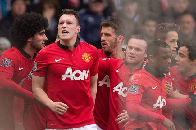 Phil Jones of Manchester United celebrates his opening goal - Barclays Premier League - West Bromwich Albion vs. Manchester United - The Hawthorns - Birmingham - England - 8th March 2014 - Picture Philip Oldham Sportimage EDITORIAL USE ONLY. No use with unauthorised audio, video, data, fixture lists, club league logos or live services. Online in-match use limited to 120 images, no video emulation. No use in betting, games or single club league player publications.
