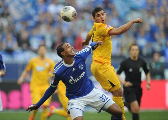 08.03.2014, Fussball, Saison 2013-2014, 1. Bundesliga, 24. Spieltag, FC Schalke 04 - 1899 Hoffenheim 4-0, Joel Matip (Schalke 04), li., gegen Kevin Volland (TSG Hoffenheim)