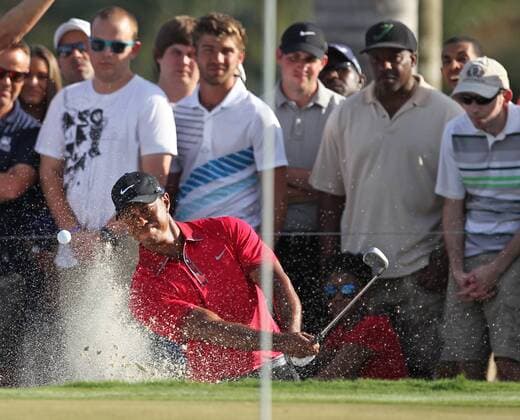 March 9, 2014 - Doral, FL, USA - Tiger Woods hits out of the bunker on the 13th hole during the fourth round of the WGC-Cadillac Championship at Trump National Doral on Sunday, March 9, 2014, in Doral, Fla. WGC-Cadillac Championship - ZUMAm67
