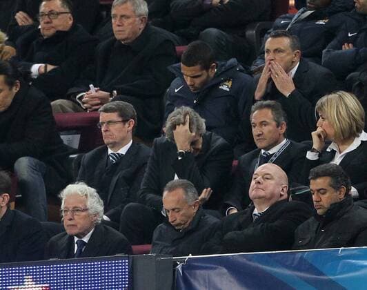 Manchester City s Manuel Pellegrini looks on dejected from the stands Barcelona v Manchester City - Champions League last 16, second leg - Nou Camp - Barcelona - Spain - 12 03 2014 - Pic David Klein Sportimage EDITORIAL USE ONLY. No use with unauthorised audio, video, data, fixture lists, club league logos or live services. Online in-match use limited to 120 images, no video emulation. No use in betting, games or single club league player publications.