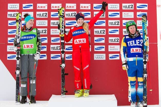 FREE STYLE - FIS WC Aare, Ski Cross AARE,SCHWEDEN,15.MAR.14 - FREE SKI, FREESTYLE SKIING - FIS Weltcup, Skicross, Damen, Siegerehrung. Bild zeigt Marielle Thompson (CAN), den Jubel von Fanny Smith (SUI) und Sandra Naeslund (SWE). 