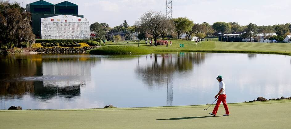 March 20, 2014 - Orlando, Florida, U.S - Ryo Ishikawa walks the 18th green during the first round of the Arnold Palmer Invitational at Bay Hill. Golf 2014 - Arnold Palmer Invitational - Round 1 - ZUMAw10