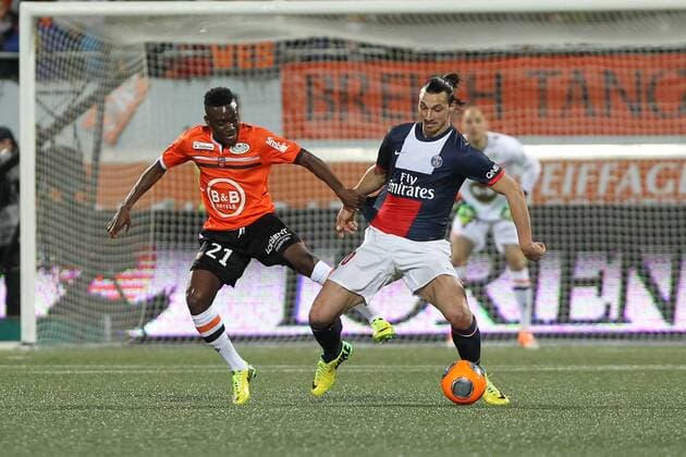 Traore Alain (Lorient) Ibrahimovic Zlatan (Paris) FOOTBALL : Match FC Lorient vs Paris SG - Ligue 1 - 21 03 2014 BrunoPerrel Panoramic 