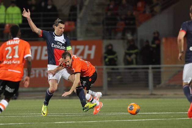 Ibrahimovic Zlatan (Paris) Baca Maxime (Lorient) FOOTBALL : Match FC Lorient vs Paris SG - Ligue 1 - 21 03 2014 BrunoPerrel Panoramic 