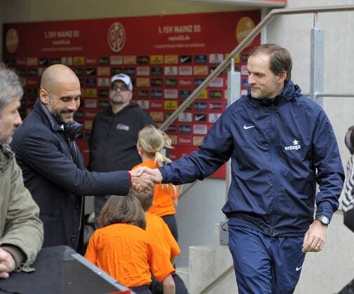 22.03.2014, Fussball 1.Bundesliga 2013 2014, 26.Spieltag, 1.FSV Mainz 05 - FC Bayern München, in der Coface-Arena Mainz. Shakehands von Trainer Pep Guardiola (Bayern München) mit Trainer Thomas Tuchel (re, Mainz). 
