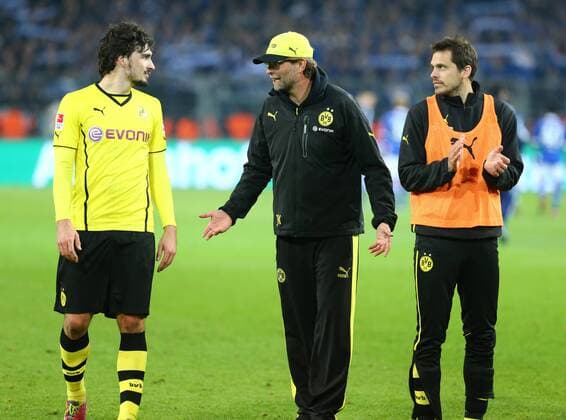 Dienstag 25.03.2014, Saison 2013 2014, 1. Bundesliga, 27. Spieltag im Dortmunder Signal Iduna Park, BVB Borussia Dortmund - FC Schalke 04, Die Dortmunder Spieler nach Schlusspfiff: Mats Hummels (BVB), Juergen Klopp (Trainer, BVB) und Manuel Friedrich (BVB), v.l.