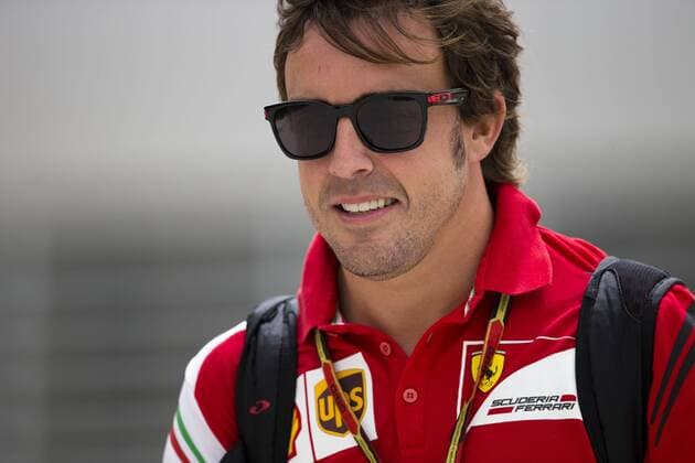 April 3, 2014 - Sakhir, Kingdom of Bahrain - FERNANDO ALONSO of Spain and Scuderia Ferrari is seen in the paddock during the preparations of the Formula 1 Bahrain Grand Prix 2014 at Bahrain International Circuit in Sakhir, Kingdom of Bahrain. F1 2014 - Bahrain Grand Prix - Preparations  - ZUMAg14