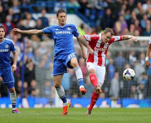 Chelsea s Nemanja Matic tussles with Stoke s Glenn Whelan Chelsea vs Stoke City- Premier League - Stamford Bridge- London - England - 05 03 2014 - Pic David Klein Sportimage EDITORIAL USE ONLY. No use with unauthorised audio, video, data, fixture lists, club league logos or live services. Online in-match use limited to 120 images, no video emulation. No use in betting, games or single club league player publications.
