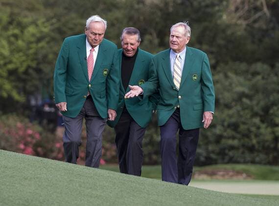 Golf legends, left to right, Arnold Palmer, Gary Player and Jack Nicklaus walk together on the 11th green together during a practice round prior to the Masters golf tournament at Augusta National Golf Club in Augusta, George, April 8, 2014.  AUG20140408353