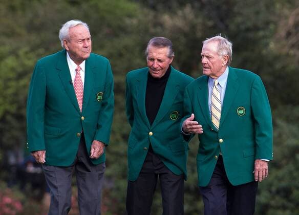 Golf legends, left to right, Arnold Palmer, Gary Player and Jack Nicklaus walk together on the 11th green together during a practice round prior to the Masters golf tournament at Augusta National Golf Club in Augusta, George, April 8, 2014.  AUG20140408361