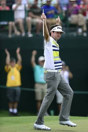 April 11, 2014 - Augusta, GA, USA - Bubba Watson celebrates his birdie putt on the 14th green in the second round at the Masters Tournament in August, Ga., on Friday, April 11, 2014. Masters Tournament - ZUMAm67