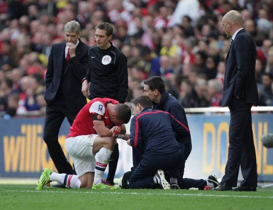 FA Cup Semi-Final - Arsenal v Wigan Athletic . . Wembley, London, UK . . 12.04.2014 Lukas Podolski (A) down on his knees. 