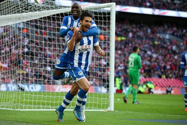 Wigan s Jordi Gomez celebrates scoring a penalty to open the scoring with Wigan s Marc-Antoine Fortune - Wigan v Arsenal - 2014 FA Cup Semi-Final - Wembley Stadium - London - 12th April 2014 - Pic Charlie Forgham-Bailey Sportimage EDITORIAL USE ONLY. No use with unauthorised audio, video, data, fixture lists, club league logos or live services. Online in-match use limited to 120 images, no video emulation. No use in betting, games or single club league player publications.