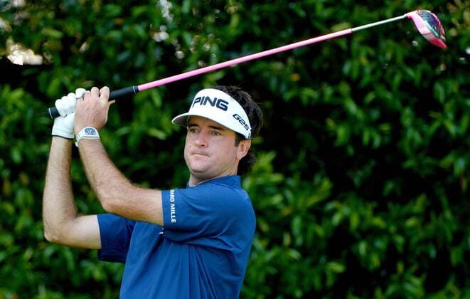 Bubba Watson hits a tee shot on the 5th hole in the third round of the 2014 Masters Tournament at Augusta National Golf Club in Augusta, Georgia on April 12, 2014.  AUG20140412329