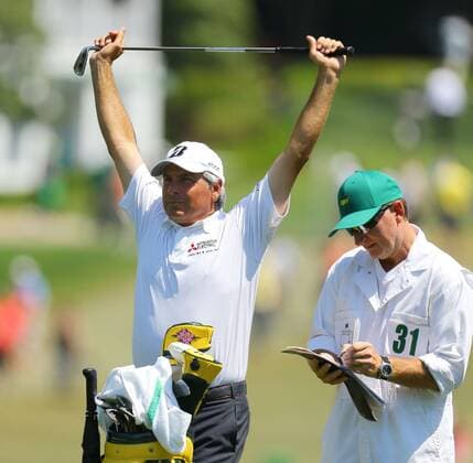 April 12, 2014 - Augusta, GA, USA - Fred Couples loosens up before his fairway shot on the 1st hole during the third round at the Masters Tournament in Augusta, Ga., Saturday, April 12, 2014. Masters Tournament - ZUMAm67