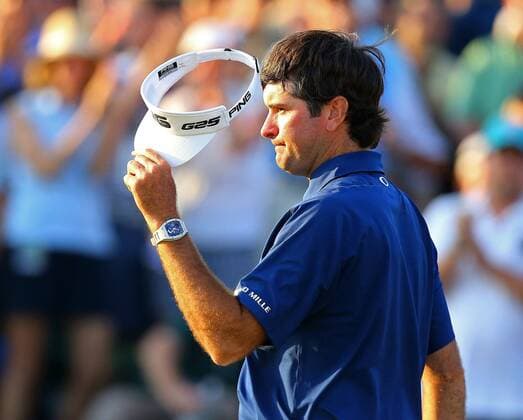April 12, 2014 - Augusta, GA, USA - Bubba Watson tips his hat to the gallery after he makes his putt to save par on the 18th green during the third round at the Masters Tournament in Augusta, Ga., Saturday, April 12, 2014. Masters Tournament - ZUMAm67