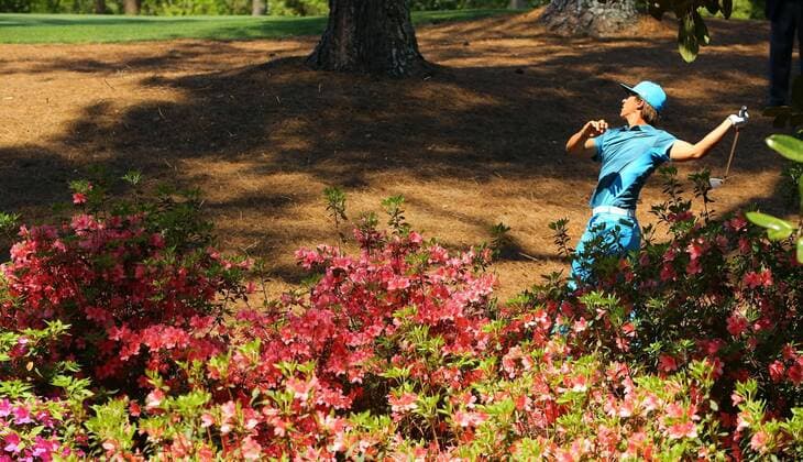 April 12, 2014 - Augusta, GA, USA - Thorbjorn Olesen hits from the edge of the azaleas after his tee shot from the 2nd hole hooked into the woods during the third round at the Masters Tournament in Augusta, Ga., Saturday, April 12, 2014. Masters Tournament - ZUMAm67