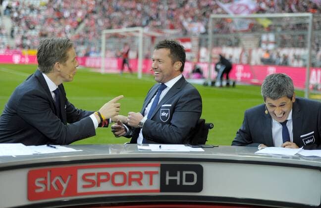 12.04.2014, Fussball 1.Bundesliga 2013 2014, 30.Spieltag, FC Bayern München - Borussia Dortmund, in der Allianz-Arena München. v.li: SKY-Sport Moderator Sebastian Hellmann, Jan Age Fjörtoft, Lothar Matthäus, am Spielfeldrand. 