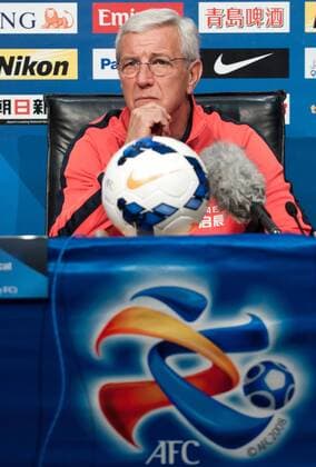 (140414) -- MELBOURNE, April 14, 2014 (Xinhua) -- Marcello Lippi, head coach of Guangzhou Evergrande of China, attends a press conference at Etihad Stadium in Melbourne, Australia, April 14, 2014. Melbourne Victory will host Guangzhou Evergrande on matchday five of the 2014 AFC Champions League at Etihad Stadium on Tuesday. (Xinhua Bai Xue) (SP)AUSTRALIA-MELBOURNE-AFC CHAMPIONS LEAGUE-GUANGZHOU EVERGRANDE-PRESS CONFERENCE 