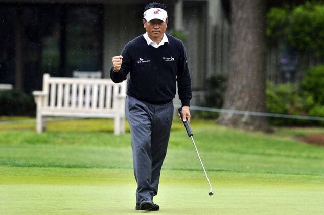 April 18, 2014 - Hilton Head Island, SC, USA - K.J. Choi reacts after sinking a putt for par on No. 16 during the second round of the RBC Heritage Presented by Boeing on Friday at Harbour Town Golf Links in Sea Pines on Hilton Head Island, S.C., Friday, April 18, 2014. RBC Heritage Presented by Boeing - ZUMAm67