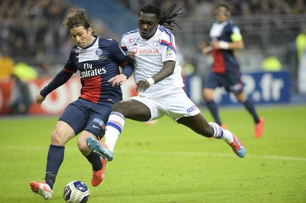 GOMIS Bafetimbi (OL) vs MAXWELL (PSG) FOOTBALL : Lyon vs PSG - Finale coupe de la Ligue - 19 04 2014 JBAutissier Panoramic 