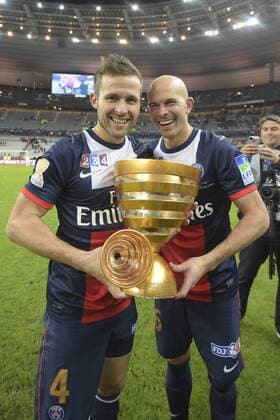Paris St Germain, Champion Coupe de la Ligue: CABAYE Yohan (PSG) avec le trophee - JALLET Christophe (PSG) FOOTBALL : Olympique Lyon vs Paris St Germain (PSG) - Finale coupe de la Ligue - 19 04 2014 JBAutissier 