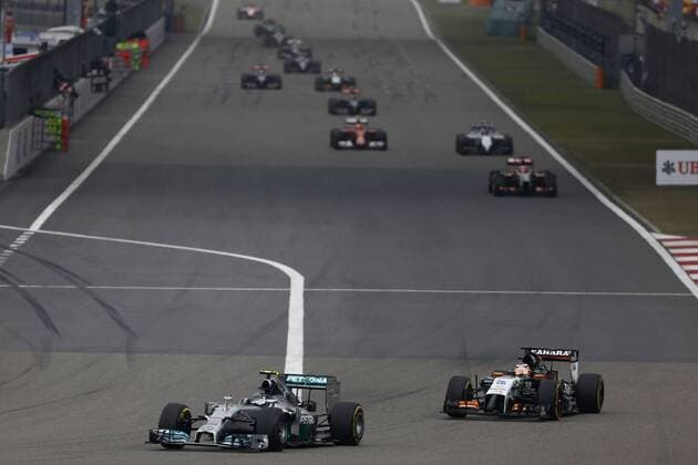 Motorsports: FIA Formula One World Championship 2014, Grand Prix of China, 6 Nico Rosberg (GER, Mercedes AMG Petronas F1 Team), 27 Nico Hulkenberg (GER, Sahara Force India F1 Team), xHOCHxZWEIx