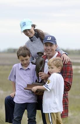 April 20, 2014 - Hilton Head Island, SC, USA - Matt Kuchar smiles with his trophy along with his wife, Sybi, and children, Cameron, left, and Carson, right, after winning the RBC Heritage Presented by Boeing on Sunday at Harbour Town Golf Links in Sea Pines on Hilton Head Island, S.C., Sunday, April 20, 2014. 2014 RBC Heritage - ZUMAm67
