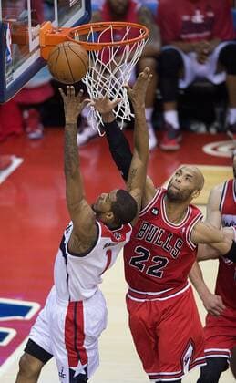 March 7, 2012 - Washington, DC, USA - Washington Wizards forward Trevor Ariza (1) scores against Chicago Bulls forward Taj Gibson (22) during the first half of their first round playoff game played at the Verizon Center in Washington, Friday, Apr. 25, 2014. Chicago Bulls vs Washington Wizards - ZUMAm67