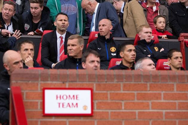 Ryan Giggs, interim manager of Manchester United looks on alongside Nicky Butt, Paul Scholes and Phil Neville - Barclays Premier League - Manchester United ManU vs. Norwich City - Old Trafford - Manchester - England - 19th April 2014 - Pic by PhilipxOldham SportImage EDITORIAL USE ONLY. No use with unauthorised audio, video, data, fixture lists, club league logos or live services. Online in-match use limited to 120 images, no video emulation. No use in betting, games or single club league player publications.