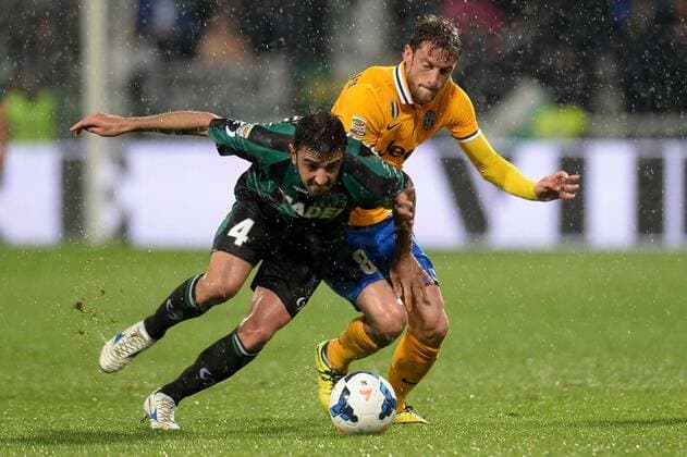 IPP20140428 Football - soccer: Serie A, Sassuolo Calcio - Juventus Turin, Francesco Magnanelli, Claudio Marchisio xHOCHxZWEIx xItalyxPhotoxPressx 