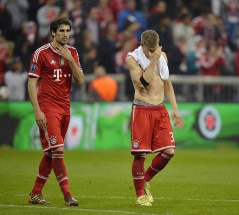 29.04.2014, Fussball Champions League 2013 2014, Halbfinale, Rückspiel, FC Bayern München - Real Madrid, in der Allianz-Arena München. v.li: Javi Martinez (FC Bayern) und Bastian Schweinsteiger (München) frustriert. 