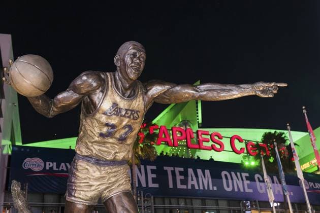 Statue of Magic Johnson - outside Staples Center before a playoff game on April 29, 2014 in Los Angeles, California. Clippers owner D. Sterling was banned for life today by the NBA Basketball Herren USA and barred from having any association with the team and ordered to pay a 2.5 dollars million fine. ChrisElise PanoramicUSA 
