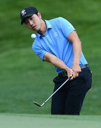 April 30, 2014 - Charlotte, NC, USA - Sang-Moon Bae chips his ball onto the 15th green during the Wells Fargo Championship Pro-Am at Quail Hollow Club in Charlotte, N.C., Wednesday, April 30, 2014. Wells Fargo Championship Pro-Am - ZUMAm67
