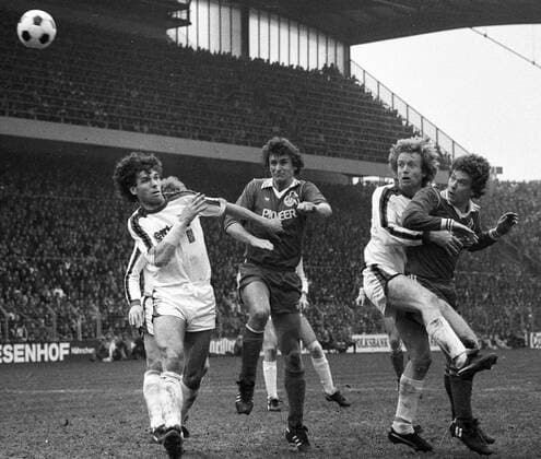 1. FC Köln - Borussia Mönchengladbach 22.3.1980 2:2. Strafraumszene mit Frank Schäffer (Borussia Mönchengladbach), Dieter Müller (Köln), Winfried Schäfer (Borussia Mönchengladbach) und Tony Woodcock (1. FC Köln). HM