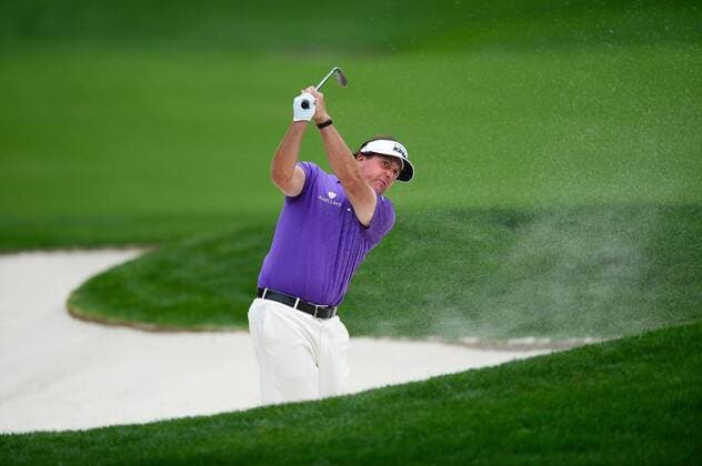May 2, 2014 - Charlotte, NC, USA - Phil Mickelson watches his shot after hitting from a bunker in the 18th fairway during the second day of competition at the Wells Fargo Championship at the Quail Hollow Club in Charlotte, N.C., Friday, May 2, 2014. Wells Fargo Championship - ZUMAm67