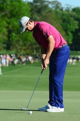 May 3, 2014 - Charlotte, NC, USA - Justin Rose sinks his putt on the 18th green during the third round of the Wells Fargo Championship at Quail Hollow Club in Charlotte, N.C., on Saturday, May 3, 2014. Wells Fargo Championship, Round 3 - ZUMAm67