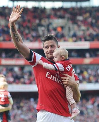 Football - 2013 2014 Premier League - FC Arsenal London vs. West Bromwich Albion Arsenal s Olivier Giroud with daughter Jade after the match at The Emirates. 