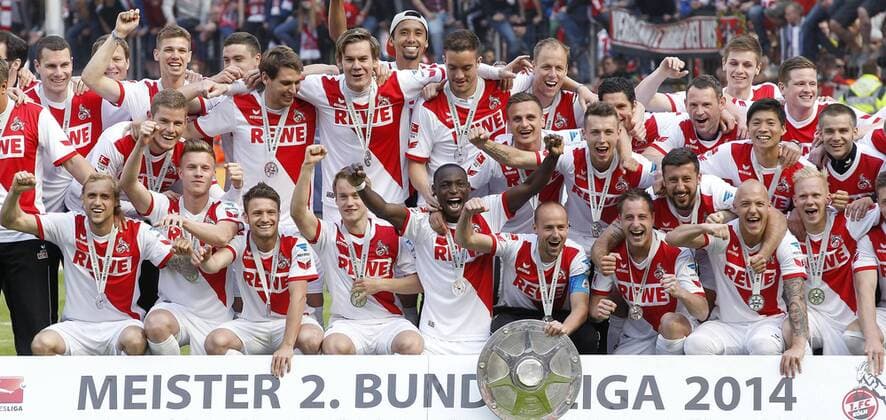 Köln, RheinEnergieStadion, 04.05.14: Meisterfeier mit Meisterschale,Gruppenfoto, Mannschaftsfoto mit Schale mit Trainer Peter Andreas Pohl, Anthony Ujah, Patrick Helmes, Kevin McKenna, Miso Brecko im Spiel zwischen 1.FC Köln vs. St. Pauli am 33. Spieltag der 2. Deutschen Bundesliga in der Saison 2013 2014.