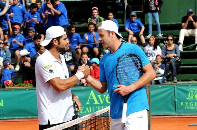 Handshake between German Julian Reister (R) (worldwide 129th) and Italian Simone Bolleli (L) (worldwide 224th) during the Final of the open Tunis. Italian tennis player Simone Bolleli (224th World) won the Tunis Open, ATP Tennis Herren tournament on clay with the 125,000 dollars in the final played on Sunday at the Tennis Club of Tunis. Tunis Open - Italian Simone Bolleli wins the trophy Tunis Open 2014 - Italian Simone Bolleli wins the trophy. 