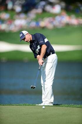 May 4, 2014 - Charlotte, NC, USA - Jim Furyk uses a putter from the edge of the 17th green during the final round of the Wells Fargo Championship at Quail Hollow Club in Charlotte, N.C., on Sunday, May 4, 2014. Wells Fargo Championship - ZUMAm67